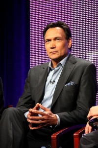 Jimmy Smits in suit during interview | Attribution License